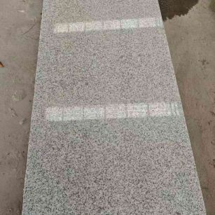 武威芝麻白光面毛板