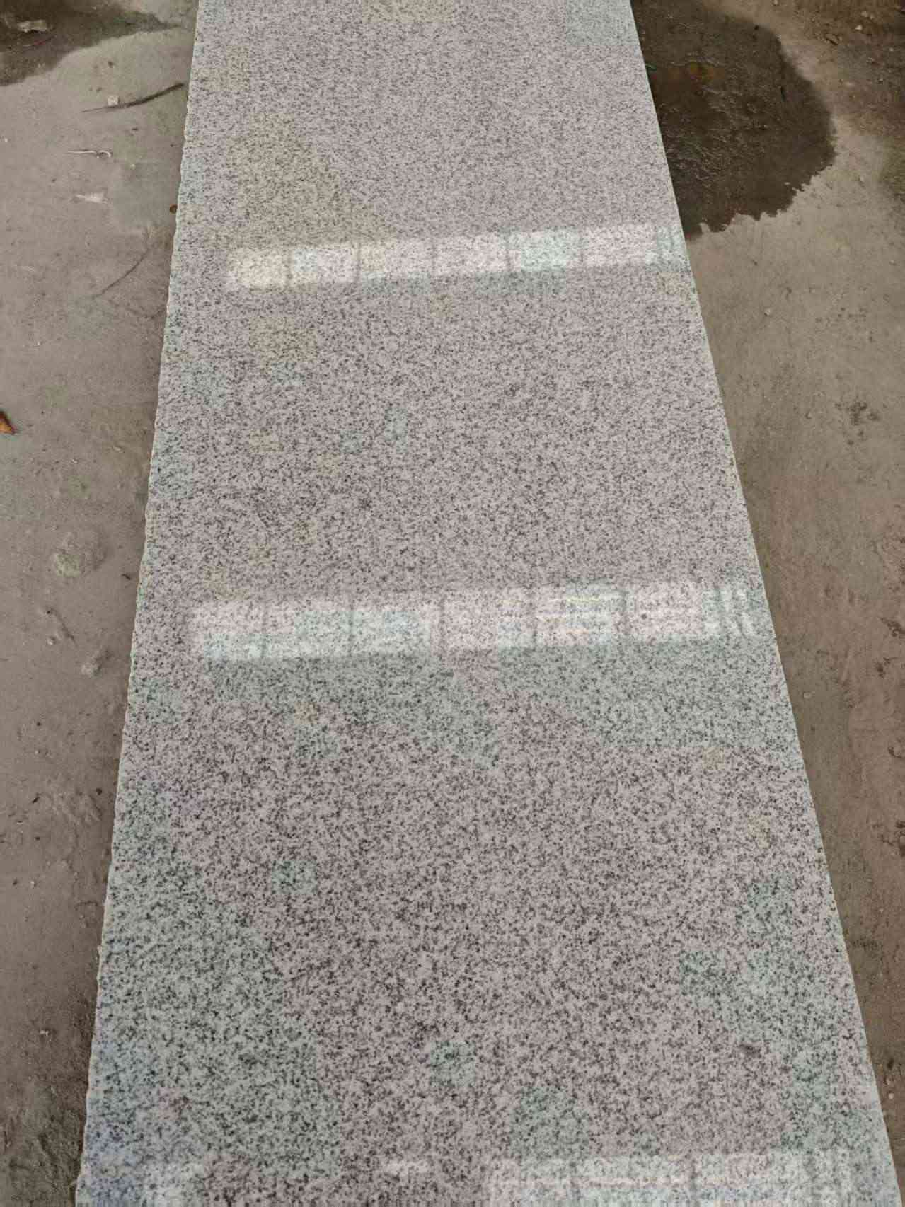 武威芝麻白光面毛板